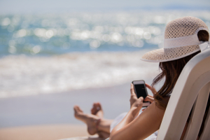Are You Oversharing On Social Media? image Posting on Social Media While On Vacation.jpg 300x200